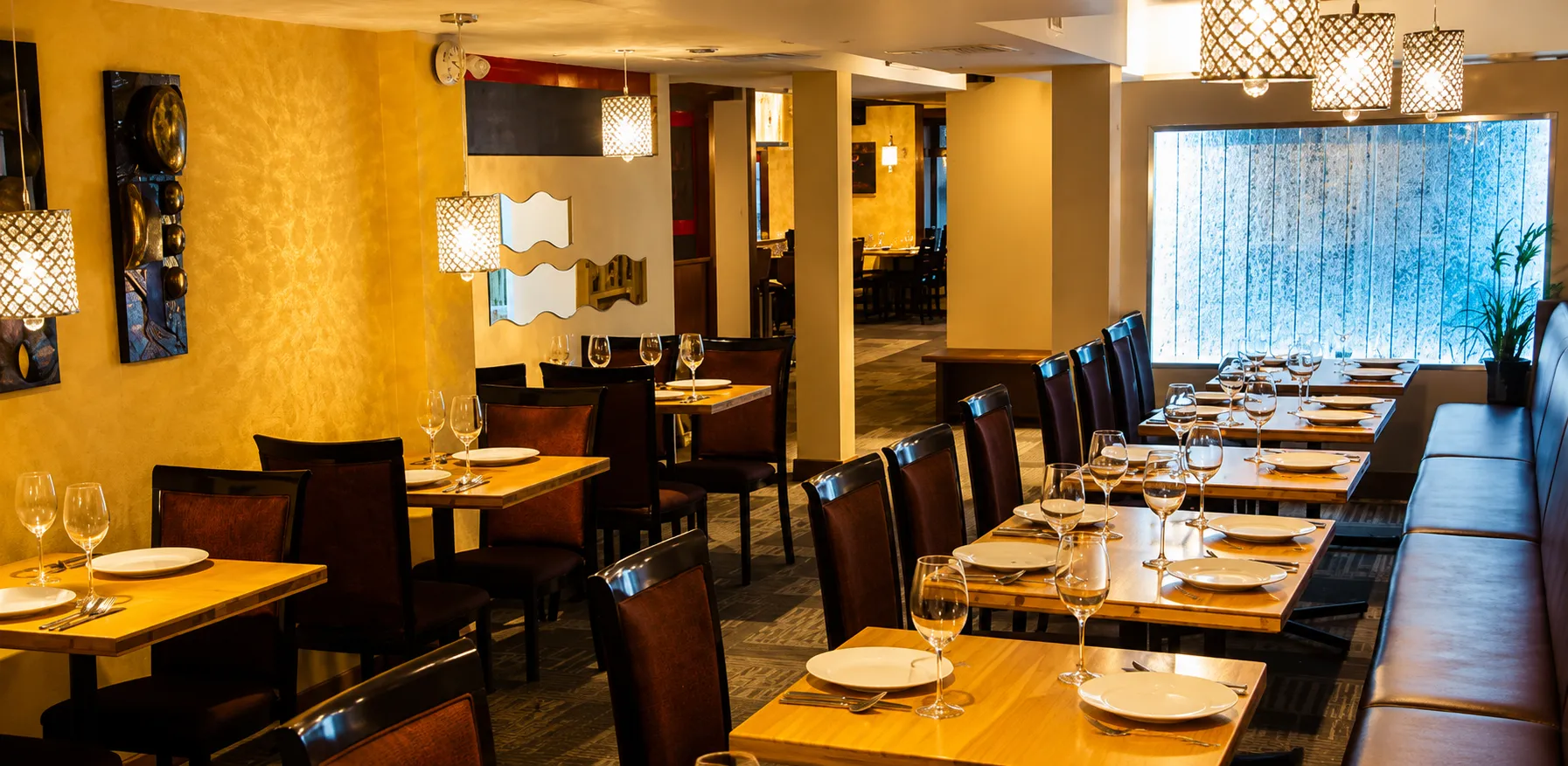 Dining room table set at Indian Curry House-Banff, the Indian restaurant serving Downtown Banff in Banff, AB